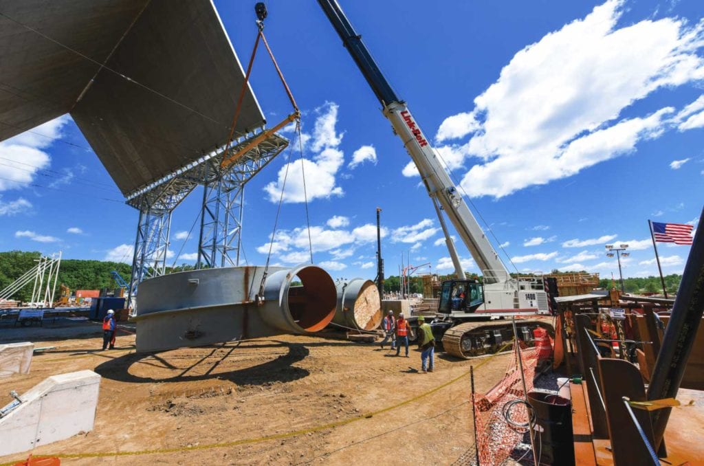 Crane lifting industrial materials