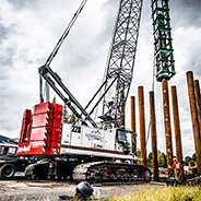 Crane Lifting Pilings