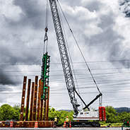 Crane Lifting Pilings